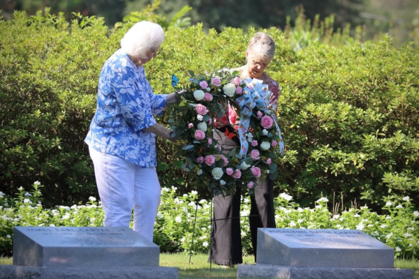 Allethea Wall, Rosalynn Carter’s sister, and Kim Carter Fuller, niece of the Carters and director of the Friends of Jimmy Carter lay the inaugural wreath at the former first lady’s burial site in Plains, Georgia on what would have been her 98th birthday